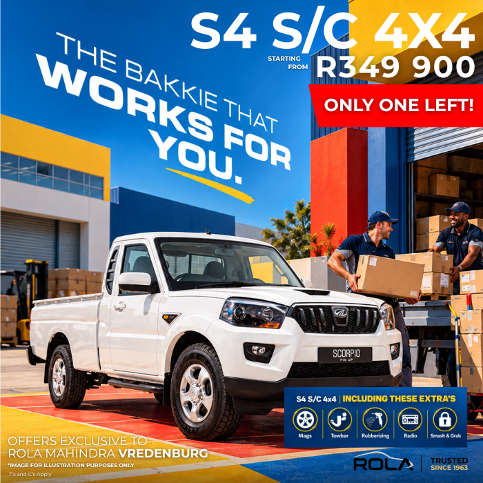 Mahindra Pik Up S4 Single Cab 4X4 from R349,900 at Rola Mahindra Vredenburg, with only one left. White Mahindra bakkie shown in a commercial setting with business workers, featuring included extras: mags, towbar, rubberising, radio and smash & grab. Mahindra bakkies for sale, Mahindra deals, Mahindra Pik Up deals, Mahindra specials and Mahindra finance. T & C’s Apply.